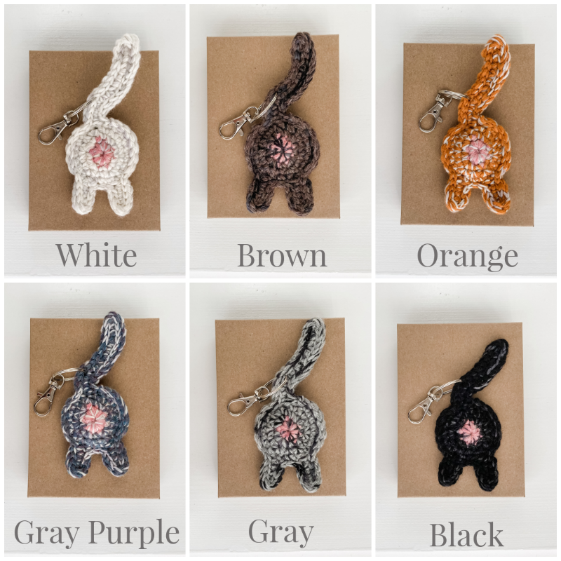 collage of different cat butt keychain color choices