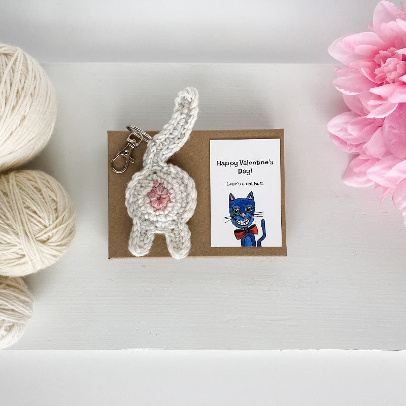 white cat butt keychain valentine's day gift with illutrated art card