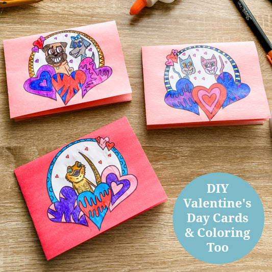 photo of 3 handmade Valentine's day featuring featuring a bearded dragon, cats in love, and dogs in love. There are patterned hears and geometric shapes.
