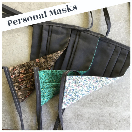 assorted patterns and gray personal face masks with gray ties