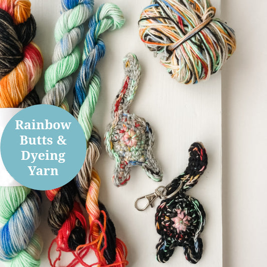 photo of rainbow yarn and  rainbow crocheted cat butts with the caption Rainbow Butts & Dyeing Yarn