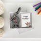 wholesale packaging for gray tabby cat butt keychain with cat art card with a clear top and white box