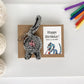 gray cat butt keychain birthday gift with illustrated snake card