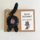Black cat butt keychain car accessory with Halloween card